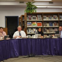 <p>The Katonah-Lewisboro school board at its Jan. 8 meeting. Interim Superintendent John Goetz is pictured in the center.</p>