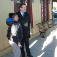 <p>Gov. Dannel P. Malloy snaps a photograph with a couple of fans at the New Canaan train station Tuesday afternoon.</p>