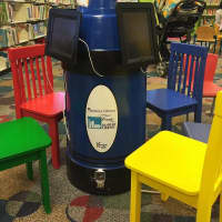 <p>The children&#x27;s room at the Danbury Public Library now has brightly colored Crayola kiosks that hold eight iPads </p>