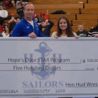 <p>The wrestling team presented a $500 check to Hope&#x27;s Door from donations from their tournament.</p>