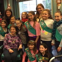 <p>Harrison Girl Scouts Troop 1885 bring cheer to The Bristal with Arlene Perazzini, a former Harrison resident and long time Girl Scout leader.</p>