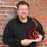 <p>Organizer Jim Keenan holds one of the three first-place trophies that will be awarded at this year&#x27;s Chilifest. </p>