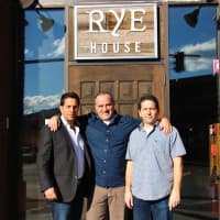 <p>The owners of Rye House Port Chester stand in front of the newly-opened restaurant.</p>