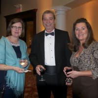 <p>Left to right: Danbury residents Cindy Merkle, Brian and Dianna Skarda,</p>