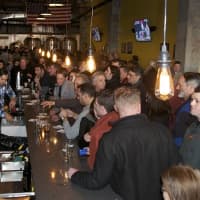 <p>The crowded bar at Saturday&#x27;s grand opening.</p>