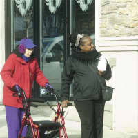 <p>Residents try to stay warm on the streets of Mamaroneck.</p>