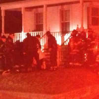 <p>Norwalk fire officials arrive on the scene of a carbon monoxide leak in a Woodward Avenue home Saturday. </p>