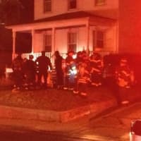 <p>Norwalk fire officials arrive on the scene of a carbon monoxide leak in a Woodward Avenue home Saturday. </p>