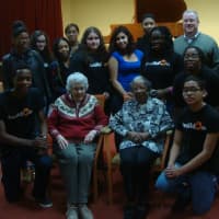<p>Geraldine Johnson with the student volunteers of BuildOn.</p>