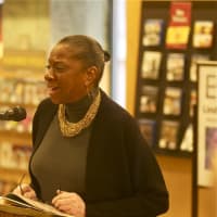 <p>Author Linda Tarrant-Reid addresses the crowd at Barnes and Noble on Martin Luther King Day.</p>