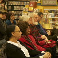 <p>An appreciative crowd, listens intently to Linda Tarrant-Reid.</p>