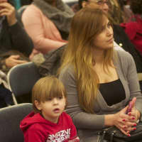 <p>Eralda Xhebroj and her three-year-old son Matias, who recently moved to White Plains from Albania, were among those in attendance at the Tarrant-Reid MLK event.</p>