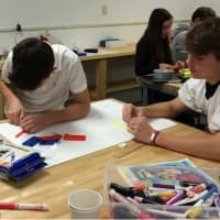 <p>Harvey students collaborating on makerspace projects</p>