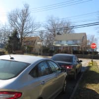 <p>Cars parked along Brown Place on Friday including one from Connecticut. A unanimous Harrison Village Board OK&#x27;d new four-hour parking limit signs here.</p>