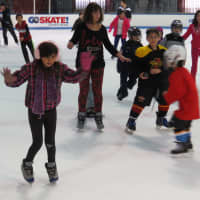 <p>There was a free family skate on the ice in Rye. </p>