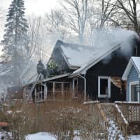 <p>Smoke can be seen billowing from a Mahopac Falls house.</p>