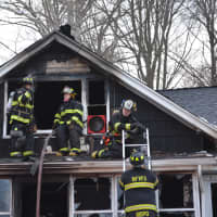 <p>Firefighters respond to a residential blaze in Mahopac Falls.</p>