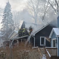 <p>Smoke can be seen billowing from a Mahopac Falls house.</p>