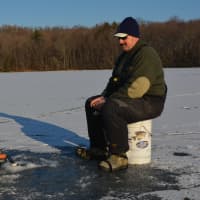 <p>Croton Falls resident Bill Weizenecker ice fishes on the Cross River Reservoir.</p>