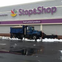 <p>A plow clears the Stop &amp; Shop parking lot after the most recent snowfall in Fairfield.</p>