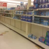 <p>Many of the aisles Monday, Jan. 26, at the Stop &amp; Shop on Kings Highway Cutoff, were almost empty, like the shelves that hold bottle water.</p>