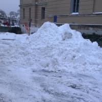 <p>Snow piles up during the plowing operations Tuesday morning in Greenwich. </p>