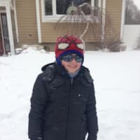 <p>Jakob is dressed for the snow and cold.</p>