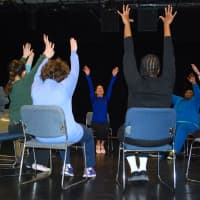 <p>Darien Arts Center Danceabilities students enjoy their weekly class in the DAC Weatherstone Studio with teachers Marie Maccarone, Elizabeth Hall and Jordan Cassetta, while Marie Maccarone leads the class in a stretch.</p>