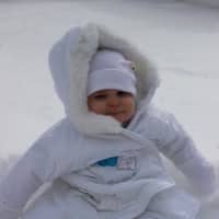 <p>Madison Iannacone, 9 months old, is bundled up in the cold. </p>
