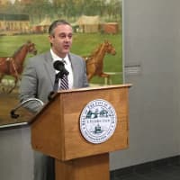 <p>Councilman John Kydes announces new heating and lighting upgrades at Norwalk City Hall designed to reduce the city&#x27;s carbon footprint and its energy costs.</p>