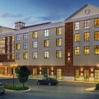 <p>A rendering of a 100-room hotel for the proposed Crossroads 312 development in Southeast.</p>