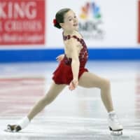 <p>Emilia Murdock performs an Ina Bauer in her program at nationals, held in Greensboro, N.C., last month. </p>