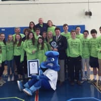 <p>Members of the Darien Youth Commission, who organized the event, along with Michael Empric and the Blue Wave mascot.</p>