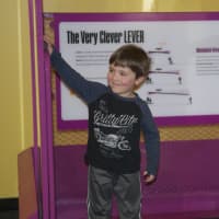 <p>Tommy Hendricks, 6, of Wilton, learns about levers.</p>