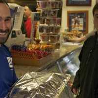 <p>Jeff Franco, of Stamford, picks up his order from Chicken Joe&#x27;s.</p>