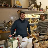 <p>Behind the counter at Mint with its extensive display of exotic cheeses.</p>