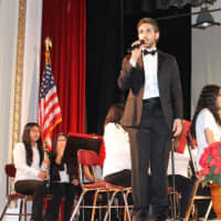 <p>Alexander Hamilton High School  band director Rob Jacoby introduces the high school band.</p>