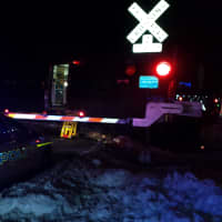 <p>The scene at Commerce Street in Valhalla where a Metro-North train collided with two cars.</p>