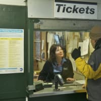 <p>A commuter asks for information at the North White Plains station, where Harlem River Line trains resumed service.</p>
