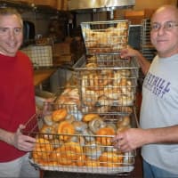 <p>Anthony and Peer Telesco standing by  bagels at their Liz-Sue bagel shop at 63 High Ridge Road. Their bother Thomas operates Liz-Sue II in Norwalk. </p>