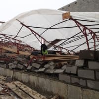 <p>Three workers suffered non-life-threatening injuries when 100 feet of scaffolding collapsed at Greens Farms Academy in Westport Thursday.</p>