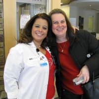 <p>Two employees of Northern Westchester Hospital.</p>