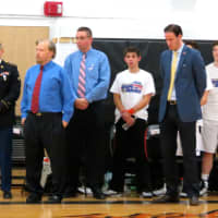 <p>Barry Fixler. who served in the Marines. spoke about his book Semper Cool, which details his service during the Vietnam War. To his right are Croton-Harmon High School alumnus Julian Bonilla and Boys Varsity basketball coach Bill Thom.</p>