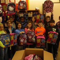 <p>Meadow Pond Elementary School&#x27;s fourth-grade class stuffed backpacks for Adirondack Central School District.</p>