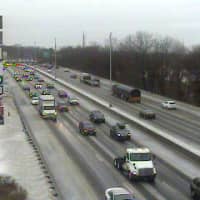 <p>The roadway of I-95 is wet and slick near the Darien rest area on Monday morning. </p>