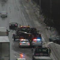 <p>A spin-out blocks a lane of I-95 south near Mill Hill Road in Fairfield on Monday morning. </p>