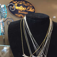 <p>Show your love with a &quot;love&quot; necklace at Indigo Chic.</p>
