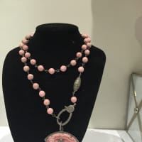 <p>Pink evil-eye necklace from Angela&#x27;s.</p>