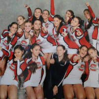 <p>Members of the Eastchester cheerleading team celebrated at Disney World on Monday.</p>