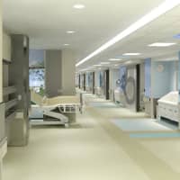 <p>A view from the hallway showing the automated sliding doors into each of the NWH operating rooms, currently being built.</p>